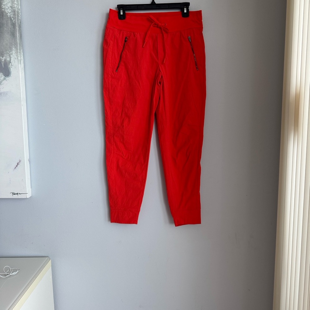 Athleta Trekkie North Jogger Womens size 8. Orange Zip Pocket Performance